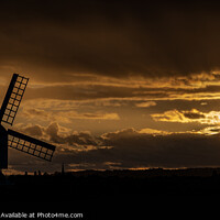 Buy canvas prints of Windmill silhouette at dusk by Cliff Kinch