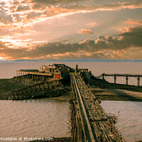 Buy canvas prints of Birnbeck Pier Sunset by Cliff Kinch