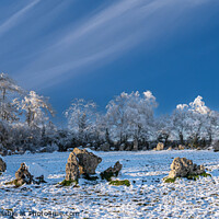 Buy canvas prints of Snow on the Rollright Stones by Cliff Kinch