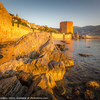 Buy canvas prints of Orange sunrise in the medieval fortress of Alanya by Alexander Volkov