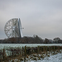Buy canvas prints of Jodrell Bank in a snow covered field  by Vicky Outen