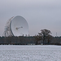 Buy canvas prints of Jodrell Bank in a snow covered field by Vicky Outen