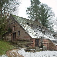 Buy canvas prints of Nether Alderley Mill in the snow  by Vicky Outen