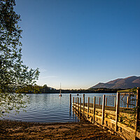 Buy canvas prints of Sunlit jetty in the Lake District  by Vicky Outen