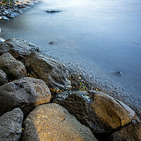 Buy canvas prints of A rocky shore next to a body of water Buttermere,  by Vicky Outen