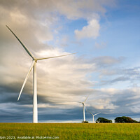 Buy canvas prints of Wind turbines at sunset by Gary Holpin
