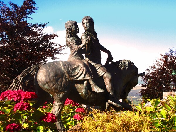 A statue of a couple  riding a horse Picture Board by Stephanie Moore