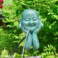 Buy canvas prints of A statue in a garden by Stephanie Moore