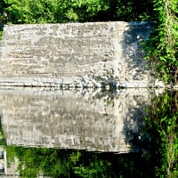 Buy canvas prints of Reflections of an old bridge by Stephanie Moore