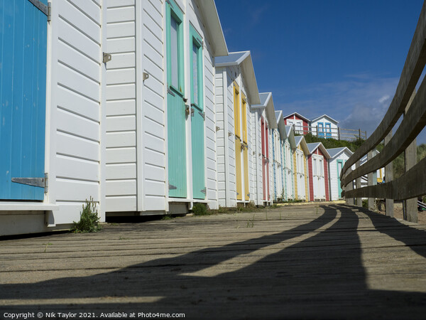 Beach huts Picture Board by Nik Taylor