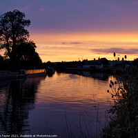 Buy canvas prints of Sunset on the Gloucester and Sharpness Canal by Nik Taylor