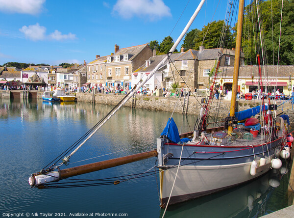 Traditional boat in Padstow harbour Picture Board by Nik Taylor