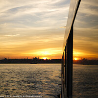 Buy canvas prints of A sunset in Istanbul with the reflection by Engin Sezer