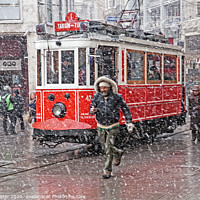 Buy canvas prints of A nostalgic tram was passing by The Istiklal Street when snowfalls at Istanbul by Engin Sezer