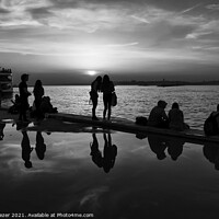 Buy canvas prints of Silhouettes of some young people with beautiful re by Engin Sezer