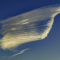 Buy canvas prints of Cloud formation against a blue sky by Rory Hailes