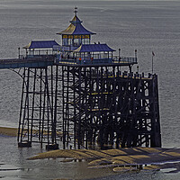 Buy canvas prints of Clevedon Pier at very low tide by Rory Hailes