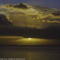 Buy canvas prints of The sun breaking through the cloud cover over the Bristol channel by Rory Hailes