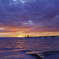 Buy canvas prints of Clevedon Pier at sunset with a pinkish hue by Rory Hailes