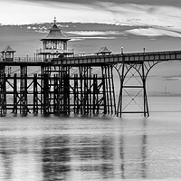 Buy canvas prints of Clevedon Pier at Sunset on a calm evening by Rory Hailes