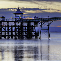 Buy canvas prints of Clevedon Pier at sunset with reflection by Rory Hailes