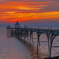 Buy canvas prints of Clevedon Pier with brigh reddish orangey horizon by Rory Hailes