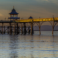 Buy canvas prints of Clevedon Pier with the side panels catching some sunlight by Rory Hailes