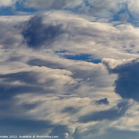 Buy canvas prints of Clouds against a blue sky by Rory Hailes