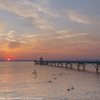 Buy canvas prints of Clevedon Pier as the sun about to set over the Welsh hills by Rory Hailes