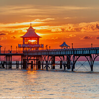 Buy canvas prints of Clevedon Pier at sunset with a colourful horizon by Rory Hailes