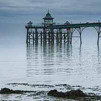 Buy canvas prints of Clevedon Pier on a calm morning with reflection by Rory Hailes