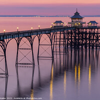 Buy canvas prints of Clevedon Pier with its lights on by Rory Hailes
