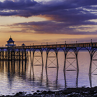 Buy canvas prints of Clevedon Pier at Sunset with a slight pinkish hue by Rory Hailes