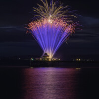 Buy canvas prints of Clevedon Pier Coronation Fireworks on a calm and t by Rory Hailes