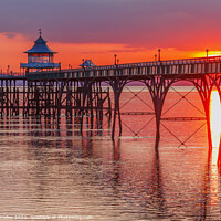 Buy canvas prints of Clevedon Pier with a streak of sunlight by Rory Hailes