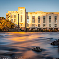 Buy canvas prints of Long exposure of the River Dee at Tongland Power Station at sunset in winter by SnapT Photography