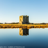 Buy canvas prints of Threave Castle reflecting on the River Dee in the winter sun and ground frost by SnapT Photography