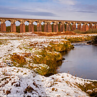 Buy canvas prints of Long exposure of the Big Water of Fleet and railway viaduct in the winter by SnapT Photography