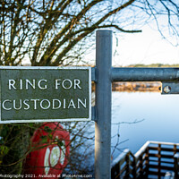 Buy canvas prints of Ring for the custodian sign at Threave Castle ferry crossing on the River Dee by SnapT Photography
