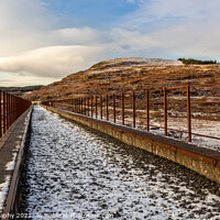 Buy canvas prints of A snow covered old railway viaduct at the Big Water of Fleet at the Cairnsmore by SnapT Photography