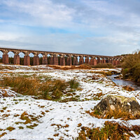 Buy canvas prints of Big Water of Fleet and railway viaduct, surrounded by snow in the winter by SnapT Photography