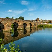 Buy canvas prints of The Medieval Devorgilla Bridge, reflecting on the River Nith by SnapT Photography