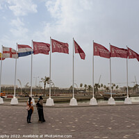 Buy canvas prints of Fifa World Cup 2022 Qatar Flags flying at the Corniche Promenade, Doha, Qatar by SnapT Photography