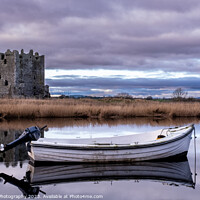 Buy canvas prints of Boat moored on the river dee with Threave Castle in the background, Scotland by SnapT Photography
