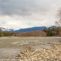 Buy canvas prints of A cold Kalum River in Spring, with Mount Garland in the background by SnapT Photography
