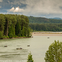 Buy canvas prints of Fishermen fishing for salmon on the Skeena River below Terrace, during a cloudy day in summer, in British Columbia, Canada by SnapT Photography