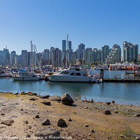 Buy canvas prints of The Vancouver skyline across Coal Harbour from the sea wall on Stanley Park by SnapT Photography
