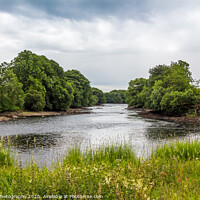 Buy canvas prints of Looking downstream on the River Dee on a cloudy su by SnapT Photography