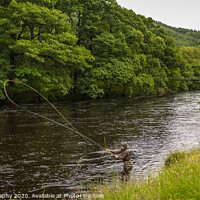 Buy canvas prints of An fisherman salmon fly fishing on the River Orchy by SnapT Photography