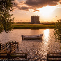 Buy canvas prints of The evening sun behind Threave Castle at the boat  by SnapT Photography